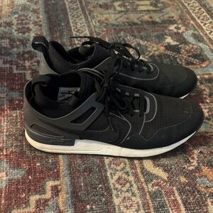 Nike women’s Black and White Sneakers